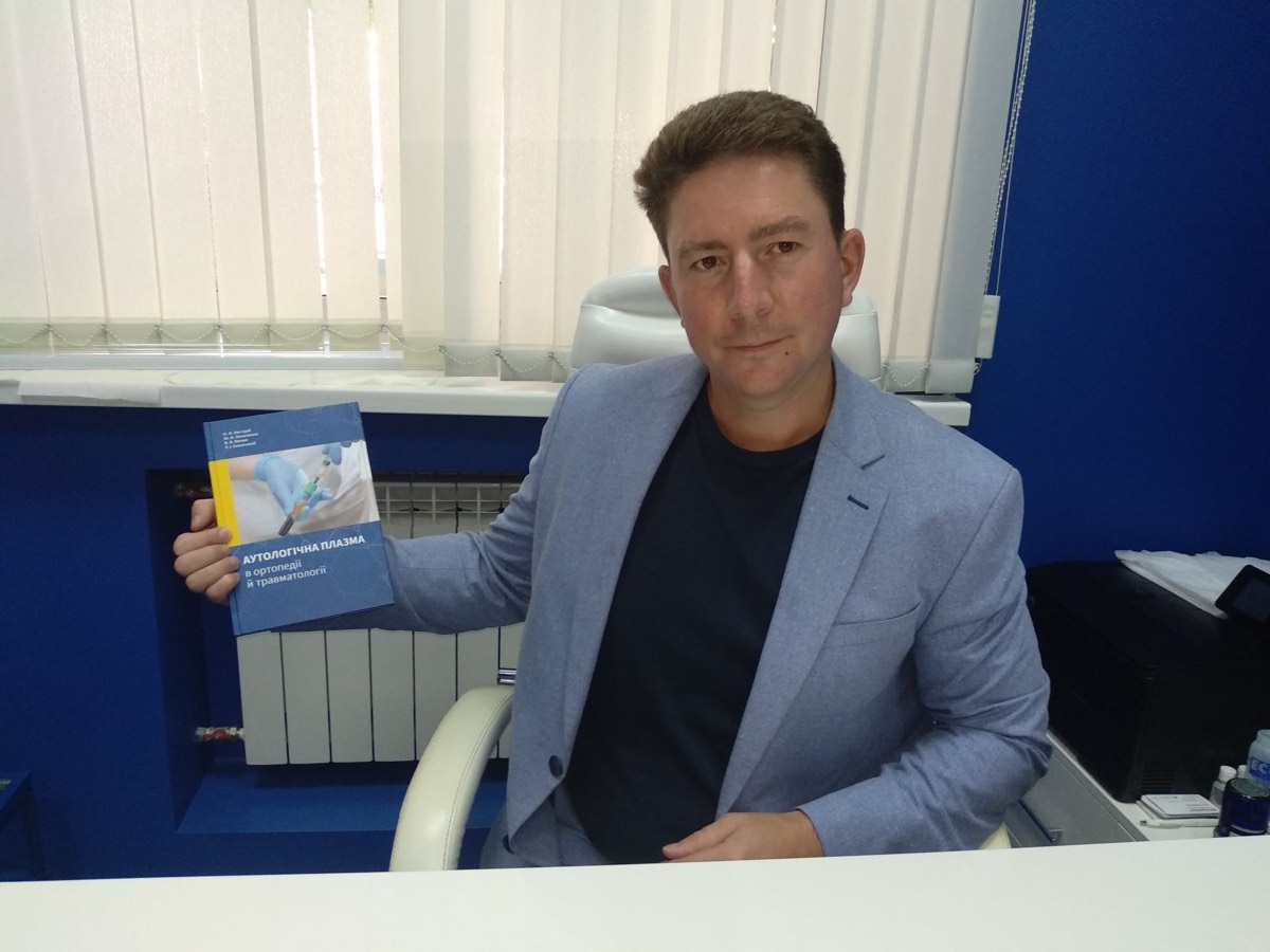 Professor Blonskyi with the monograph «Autologous plasma in orthopaedics and traumatology»